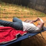 Cade Cason laying on cot